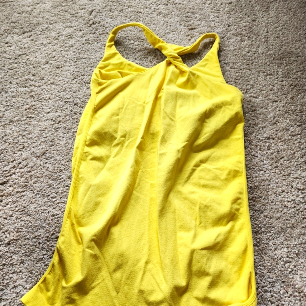 Bebe yellow twist racerback tanktop size M/L  built-in bra.